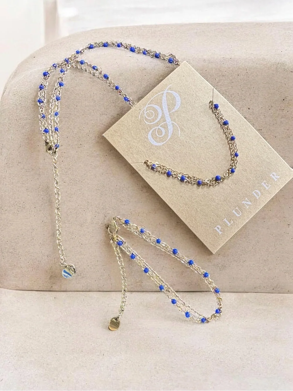 Plunder Gold-Tone Necklace and Bracelet Set with Cobalt Blue Beads (v)